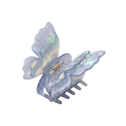 blue glass butterfly hair clip iridescent acetate close up kanella london