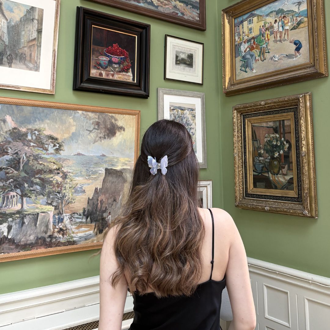 butterfly hair clip worn in brown hair gallery wall aesthetic — kanella london